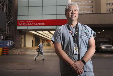 Dr. Jacques Lee standing in front of Emergency Department